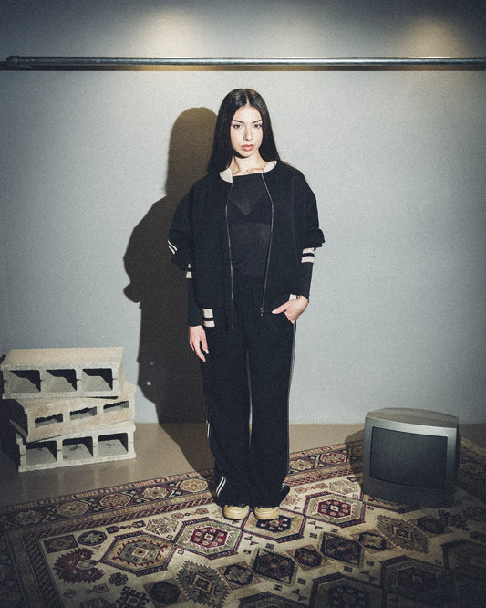 Tuta nera con bande lumina (Pantalone)