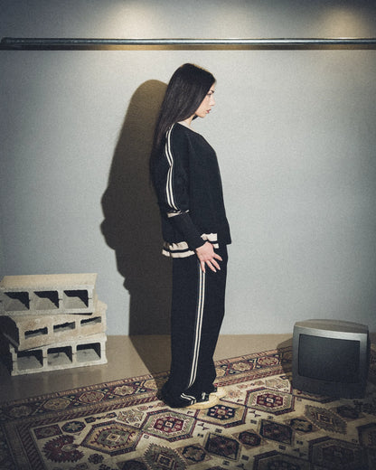 Tuta nera con bande lumina (Giacca)