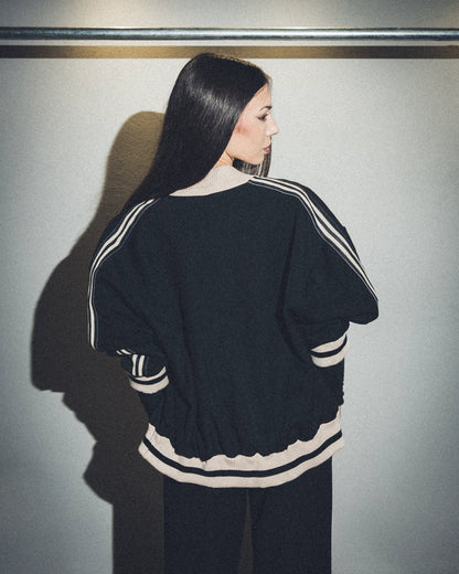 Tuta nera con bande lumina (Giacca)