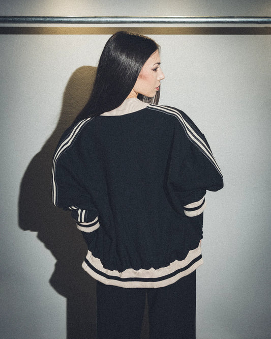 Tuta nera con bande lumina (Giacca)