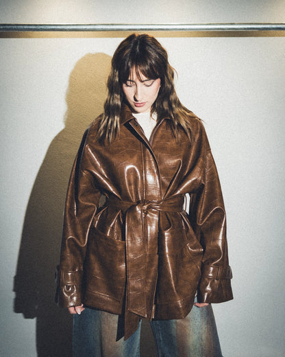 Trench lumina in ecopelle